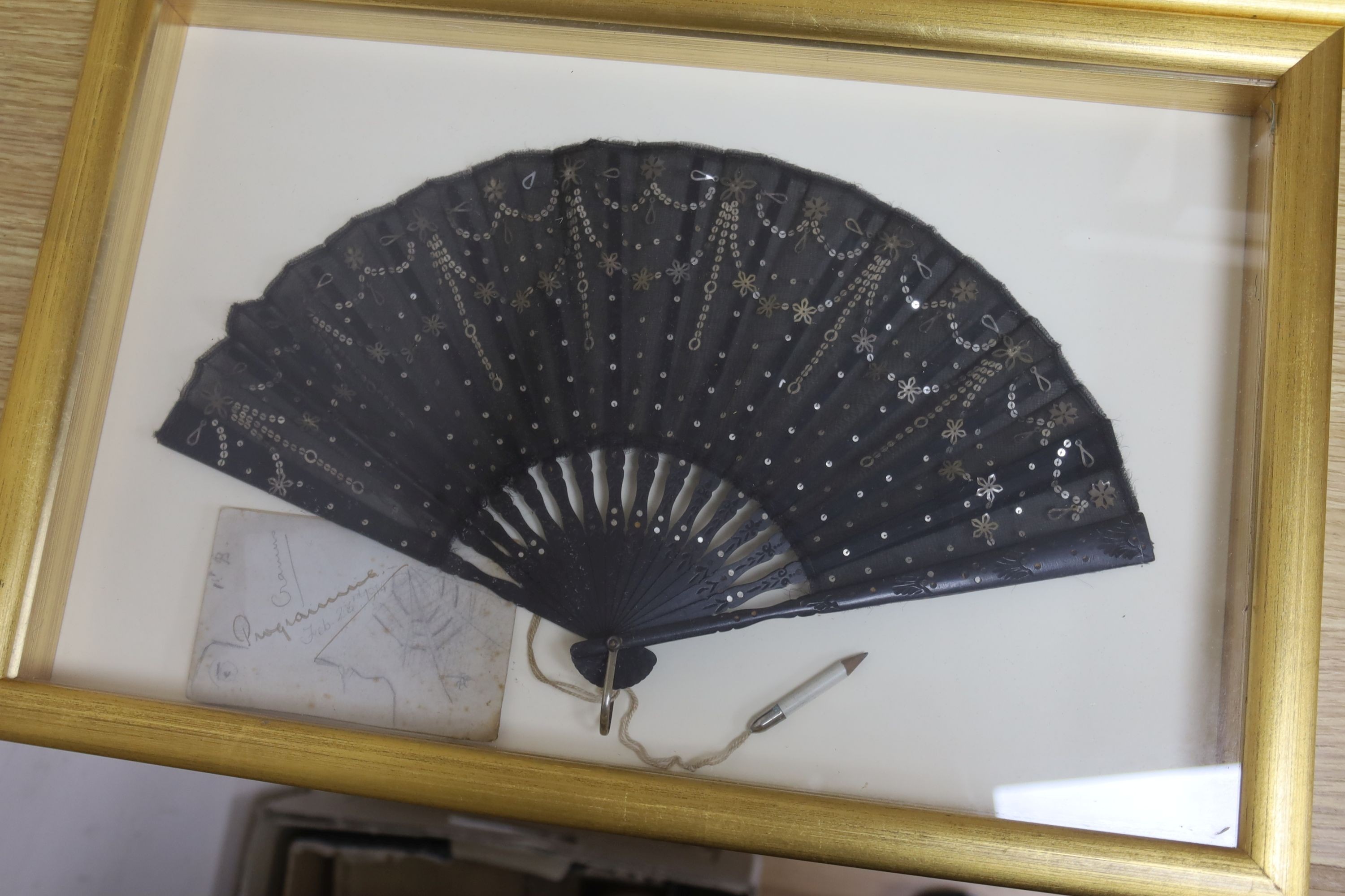 Three 19th century black sequin mounted fans, One hand painted, largest case 38.5 x 60.5 cm